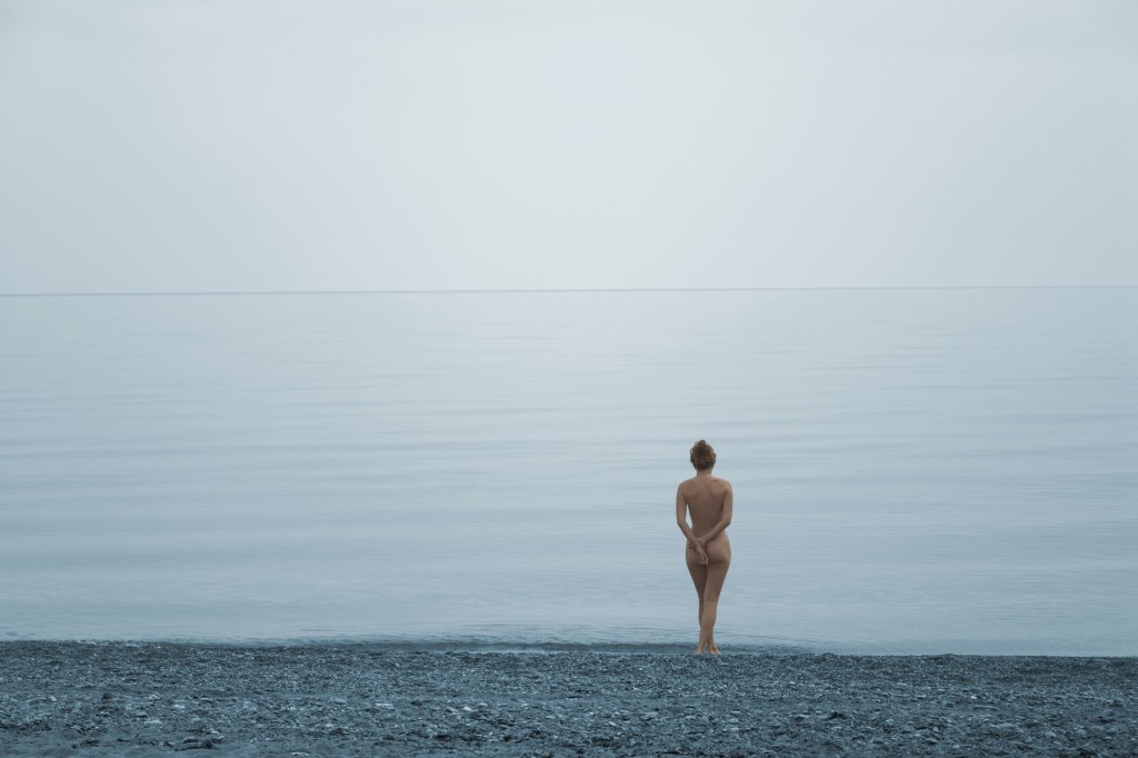 Nude girl on the seaside
