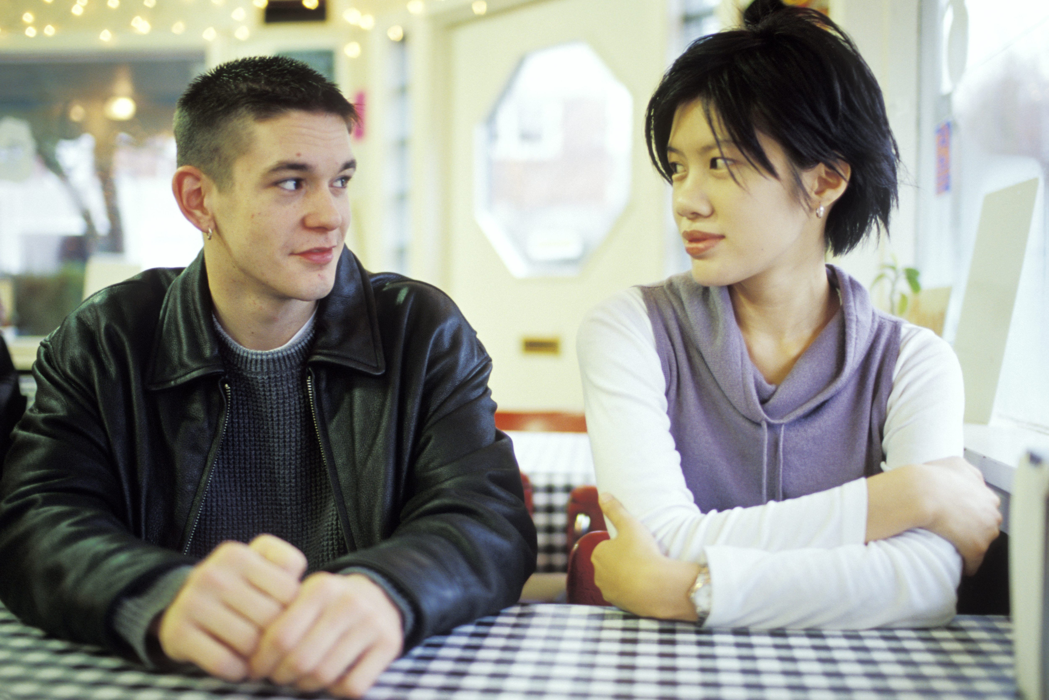 Man and Woman Talking at a Diner
