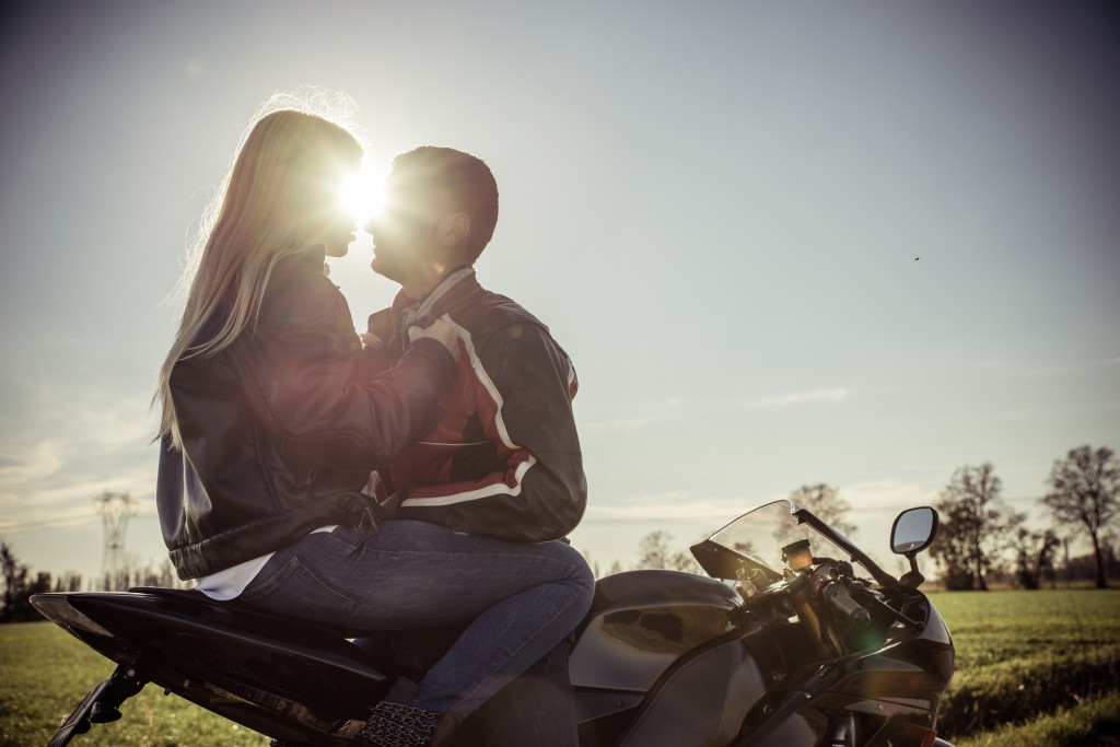 Couple of lovers on motorbike